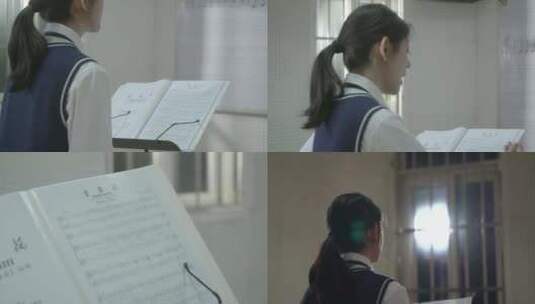 唯美学校音乐课声乐学科女孩琴房看乐谱练歌高清在线视频素材下载