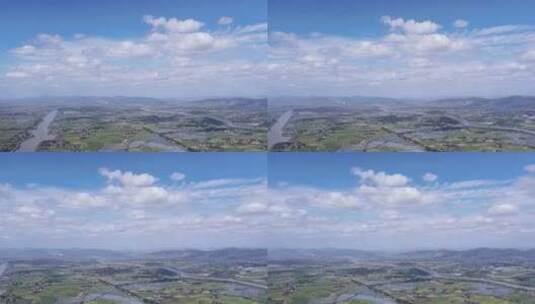 农村航拍新农村无人机俯视蓝天白云稻田野高清在线视频素材下载