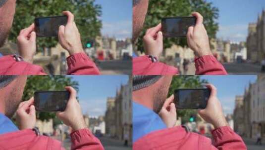 在旧牛津建筑旁拍照的人高清在线视频素材下载