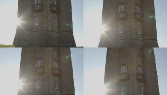 建筑旁的太阳耀斑高清在线视频素材下载