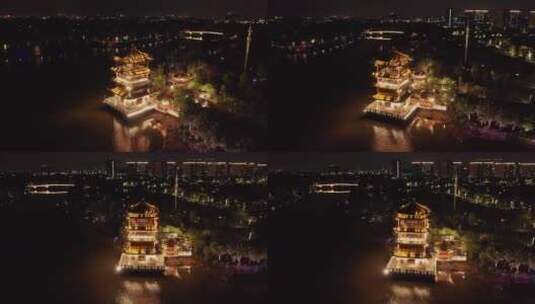 东莞航拍华阳湖湿地公园夜景腾龙阁环绕高清在线视频素材下载