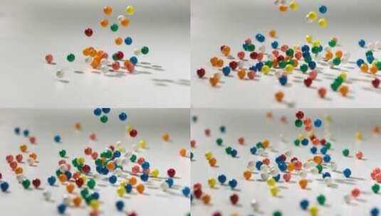 多个彩色糖豆掉落高清在线视频素材下载