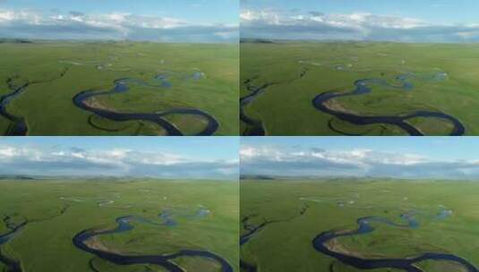 航拍碧绿草原蓝色的河流高清在线视频素材下载