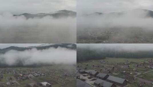 新疆禾木航拍村庄云层高清在线视频素材下载
