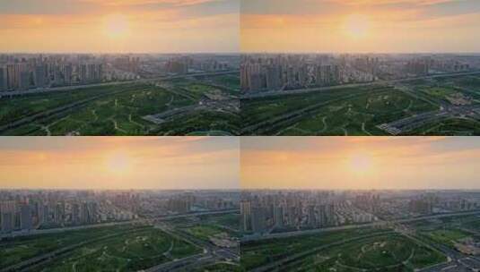 航拍城市大景夕阳日出高清在线视频素材下载