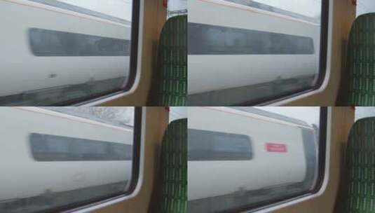 从行驶的火车上望出去，经过另一辆火车高清在线视频素材下载