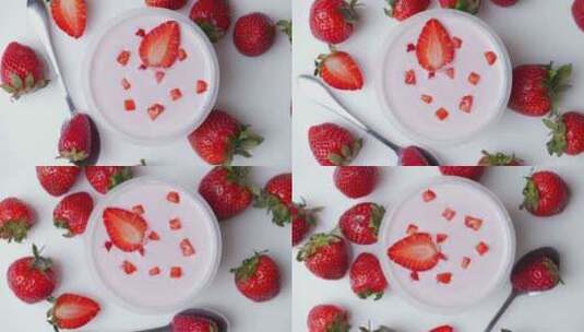一碗美味的酸奶和草莓在桌子上旋转高清在线视频素材下载