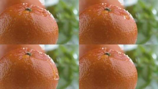 水滴从橙子上落下特写高清在线视频素材下载