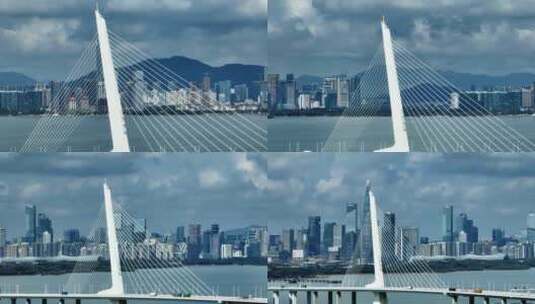 深圳湾跨海大桥上的城市地标建筑风光航拍高清在线视频素材下载