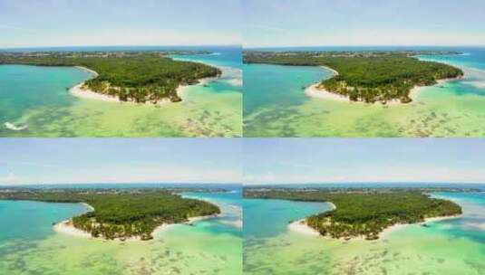 航拍海岛海边度假酒店度假屋沙滩大海绿树林高清在线视频素材下载