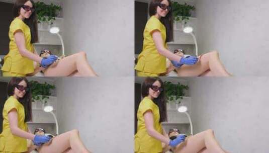 美容师正在护理女子腿部皮肤高清在线视频素材下载