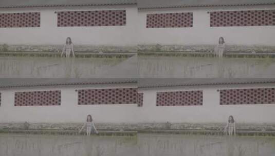 女孩乡村秧苗田间玩水欣赏秧苗风景灰片高清在线视频素材下载