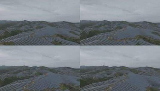 航拍山上的太阳能光伏发电站高清在线视频素材下载