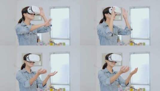 女人用虚拟现实设备高清在线视频素材下载
