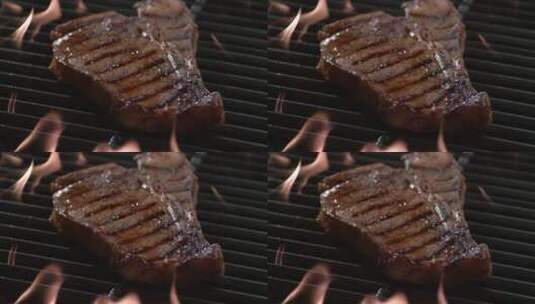烧烤架上烤着牛排高清在线视频素材下载