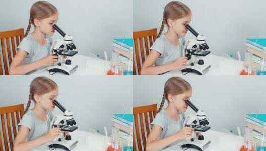 女学生使用显微镜高清在线视频素材下载