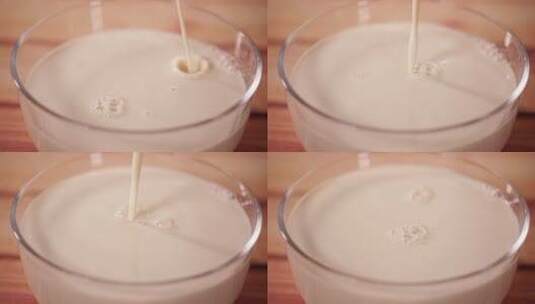 玻璃碗倒牛奶豆奶奶粉高清在线视频素材下载