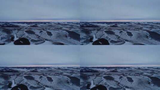 航拍冰雪覆盖的山地风光高清在线视频素材下载