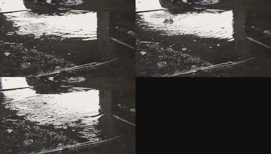 雨滴撞击桥下的水坑高清在线视频素材下载