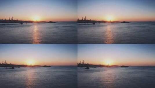 航拍日出时的青岛栈桥风光高清在线视频素材下载