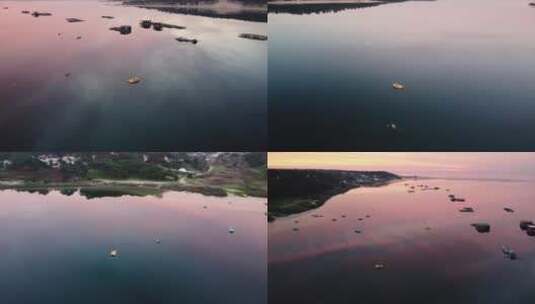 夕阳傍晚海边小城海面小船航拍高清在线视频素材下载