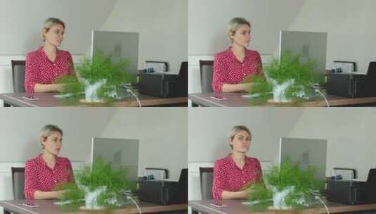 女人坐桌办公桌看电脑高清在线视频素材下载
