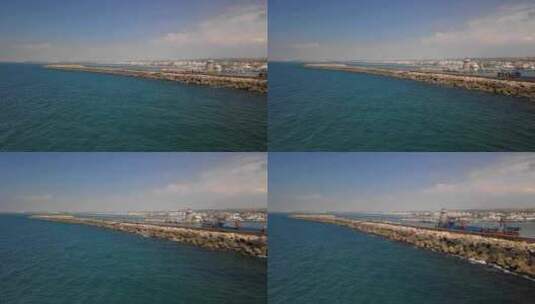 一个阳光明媚的夏日，阿尔梅里亚的阿尔梅里马尔港。航拍。高清在线视频素材下载