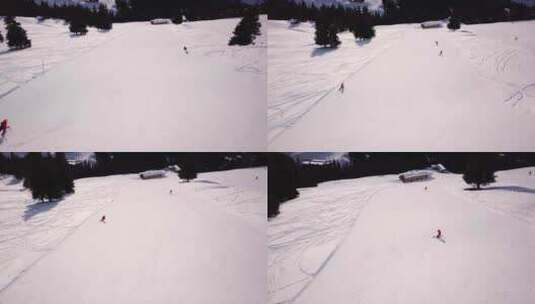 冬季高山滑雪的滑雪者下坡滑雪高清在线视频素材下载