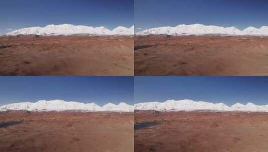 航拍新疆喀什帕米尔高原公格尔九别峰雪山高清在线视频素材下载