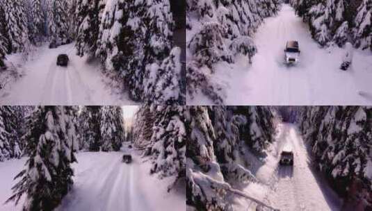 航拍吉普越野汽车行驶在雪景森林雪路中高清在线视频素材下载