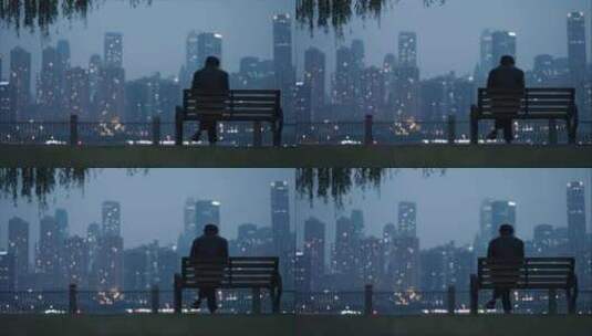 城市-人文-夜晚重庆城市夜景下孤独的背影高清在线视频素材下载