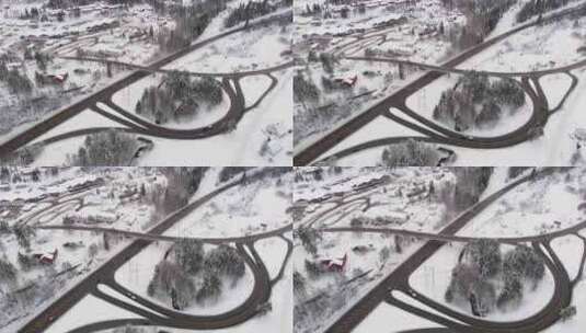 冰雪覆盖的挪威冬季弯曲的道路和狭窄的公路高清在线视频素材下载