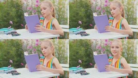 女孩在公园里读书高清在线视频素材下载