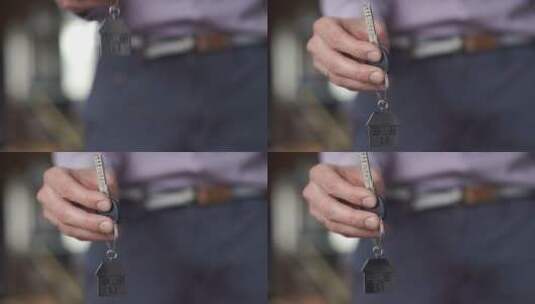 男人手里拿着新钥匙高清在线视频素材下载
