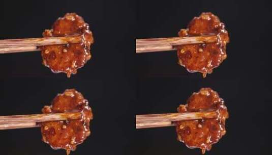 特写筷子夹起红烧肉高清在线视频素材下载