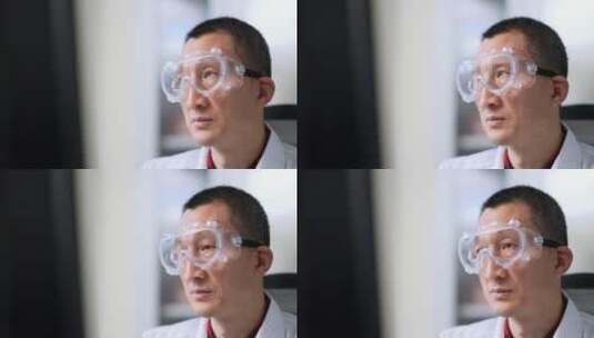 办公室科研实验室戴着护目镜中年男技术人员高清在线视频素材下载