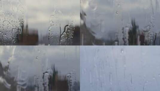 下雨天窗外雨滴落下慢镜头高清在线视频素材下载