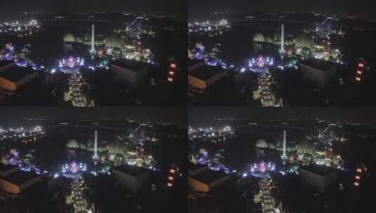 航拍上海欢乐谷夜景舞台灯光秀高清在线视频素材下载