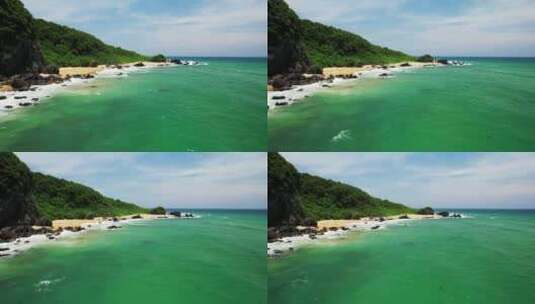 海南万宁海边海浪礁石航拍4k视频高清在线视频素材下载
