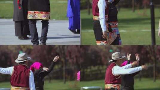 4k升格实拍穿藏族民族服饰跳舞的老年人中景高清在线视频素材下载