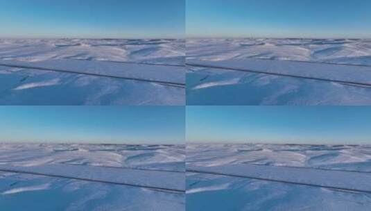 航拍呼伦贝尔草原暮色雪原高清在线视频素材下载