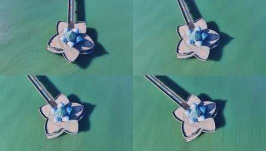 山东烟台海边的东山栈桥航拍建筑城市风景高清在线视频素材下载