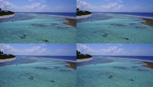 高分辨率白色天堂海滩和绿松石海背景的日间空中岛屿视图高清在线视频素材下载