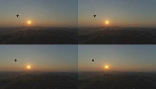 日出时飞翔的热气球高清在线视频素材下载