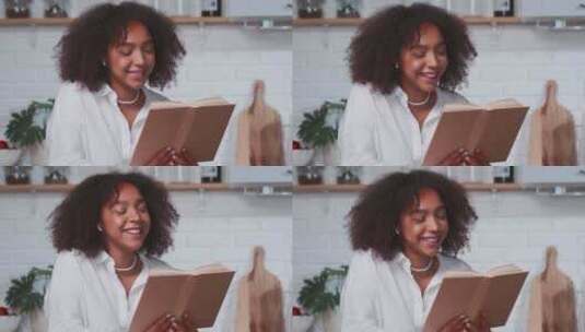 心满意足的年轻西班牙裔女人读书笑高清在线视频素材下载
