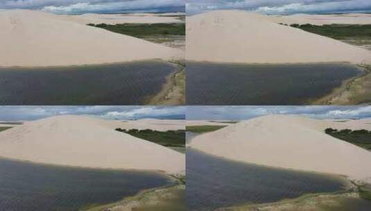 Jericoacoara Ceara巴西。风景优美的沙丘和绿松石雨水湖高清在线视频素材下载