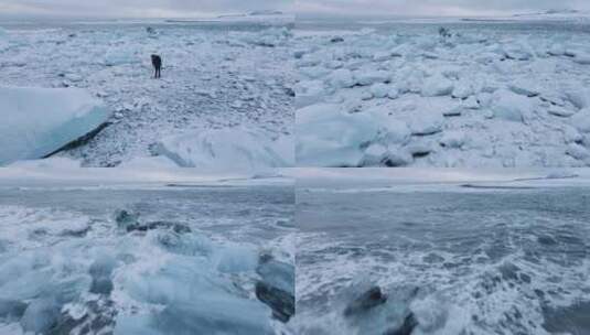 冰岛冰川泻湖附近钻石海滩上的无人机越过摄影师高清在线视频素材下载