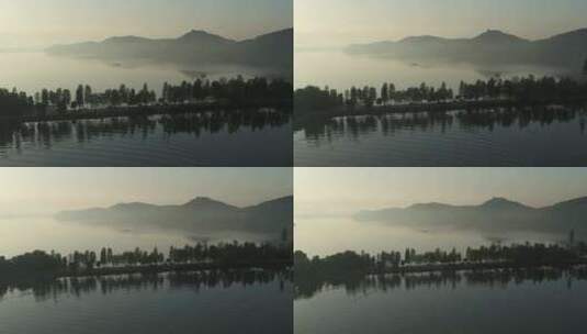 航拍武汉东湖绿道傍晚远山湖面高清在线视频素材下载