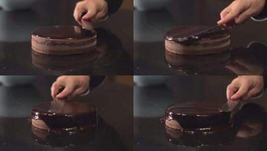 给巧克力蛋糕抹上巧克力酱高清在线视频素材下载