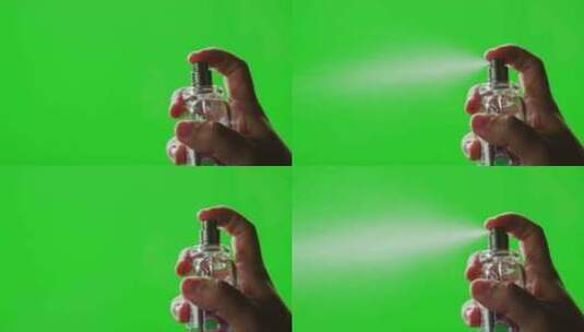 年轻人将香水涂抹在皮肤上色度键绿色屏幕特高清在线视频素材下载